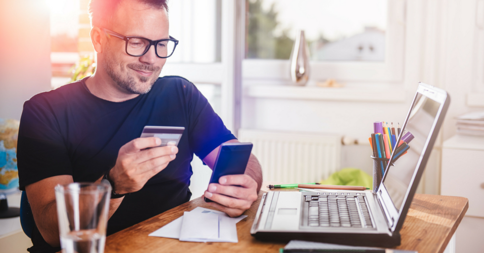 Happy-man-ordering-smartphone