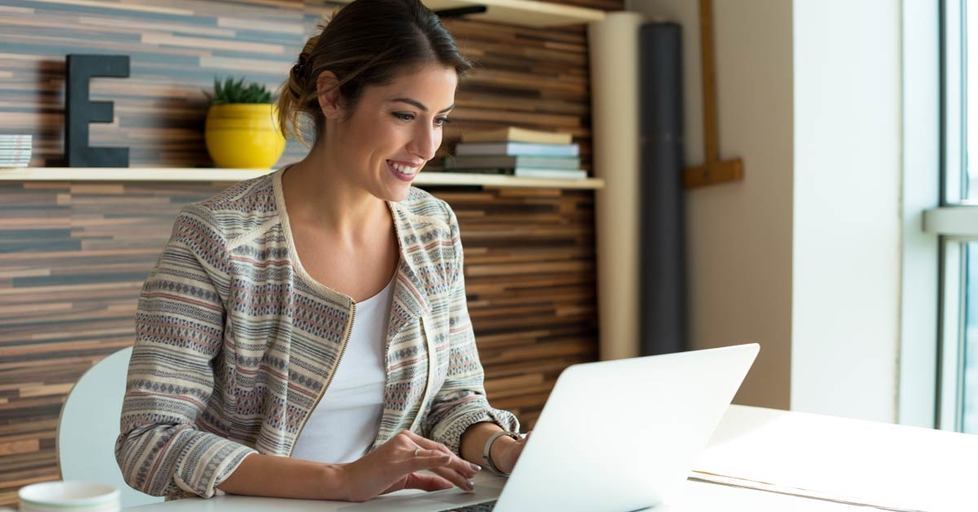 Woman-working-at-desk-laptop