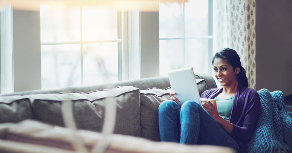 Woman-using-ipad-at-home-alone